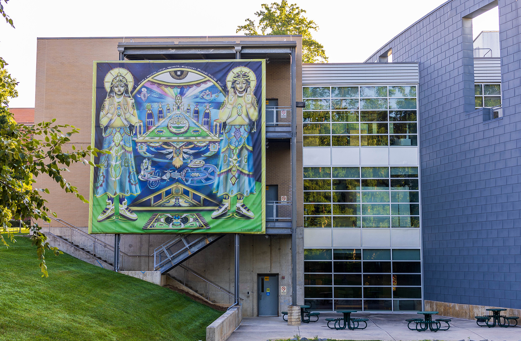 Aricama Portal, mural on mesh fabric, 2018, by visiting artist, Maricama (Maria Camia), New York, installed on the west side of the Art and Design building.
