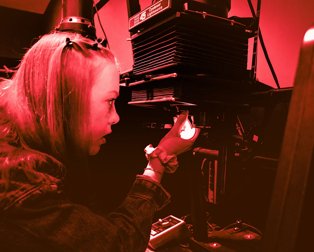 Student working in the darkroom