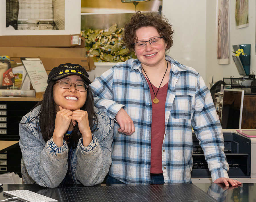 Print Studio Manager Annie Chen and assistant Alix Nyden are ready to help you with your projects at the Print Studio.