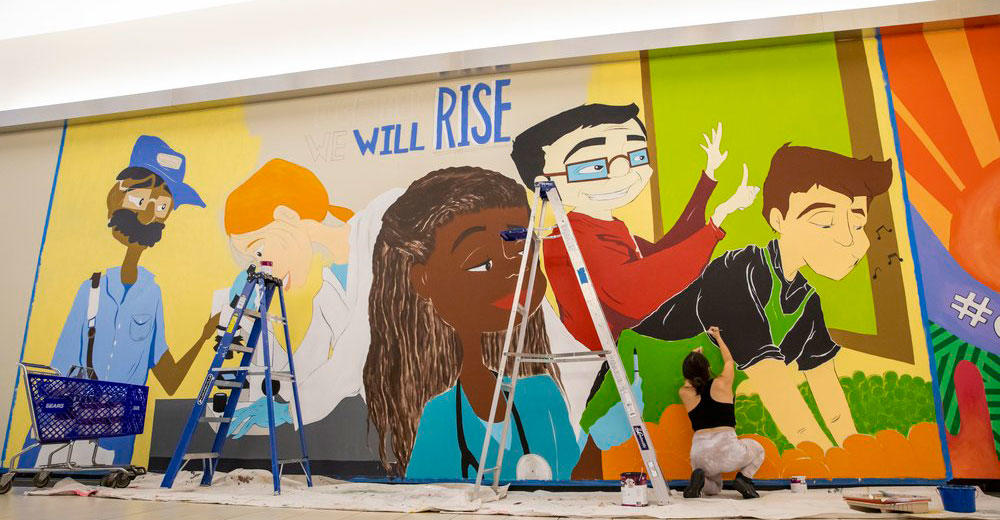 Alum, Carina Santillan's mural "Heroes" at the Manassas Mall, 2022