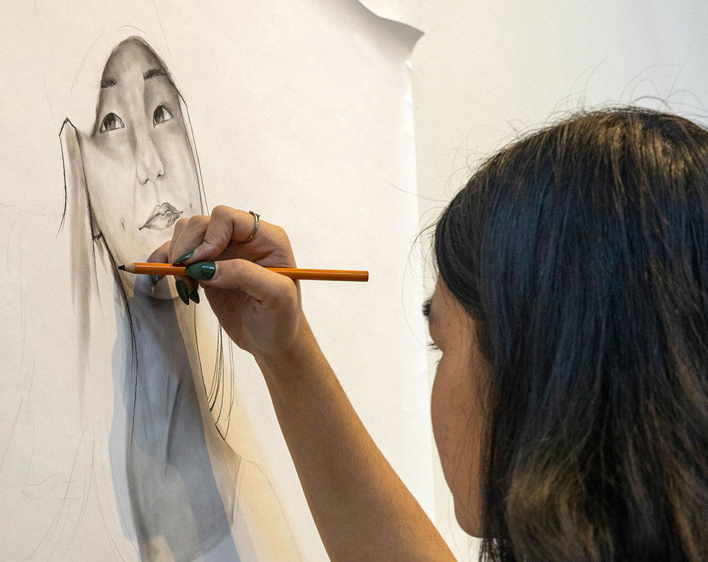 drawing student at Mason School of Art