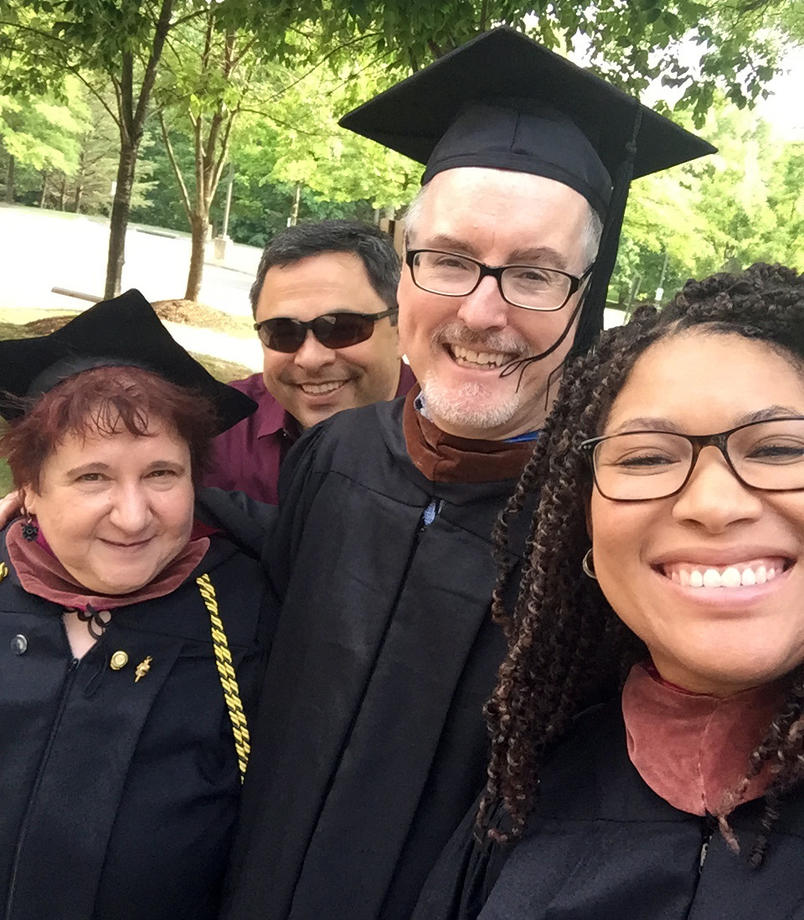 Reece Quinones with fellow School of Art and School of Theater faculty.